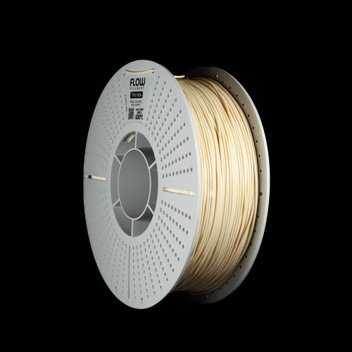 A spool of 3D printing filament wound on a white perforated spool, shown against a solid black background. The filament itself is a beigh color.