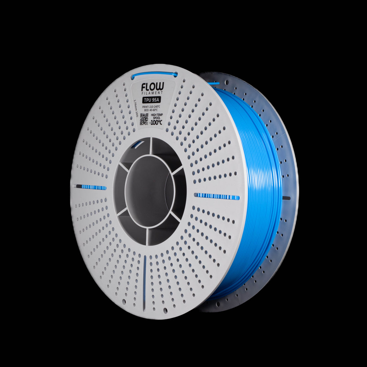 A spool of blue 3D printing filament on a white perforated spool, shown against a solid black background. The brand name 'FLOW' is visible on the top of the spool.