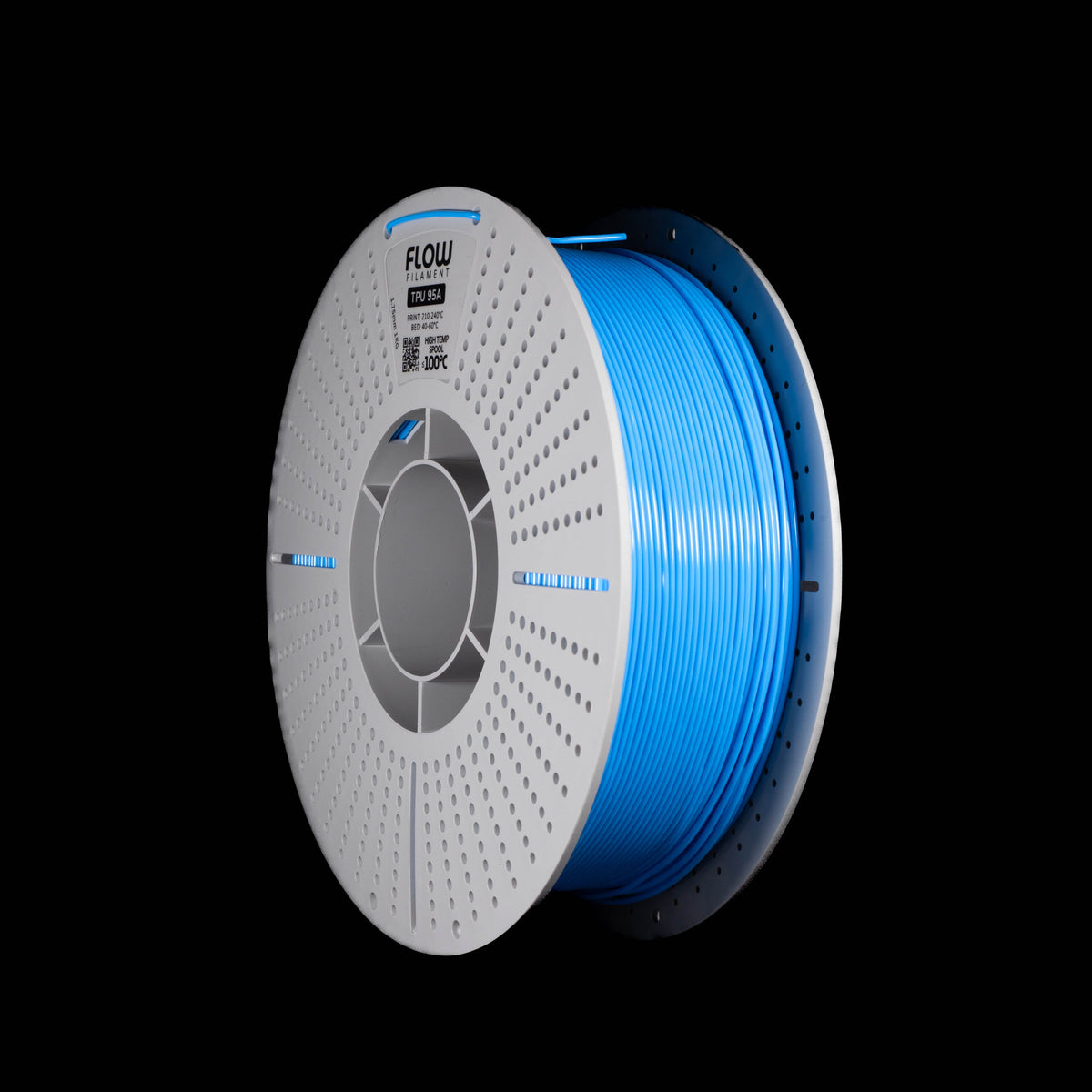 A spool of blue 3D printing filament wound on a white perforated spool, shown against a solid black background. The brand name 'FLOW' is visible on the top of the spool.
