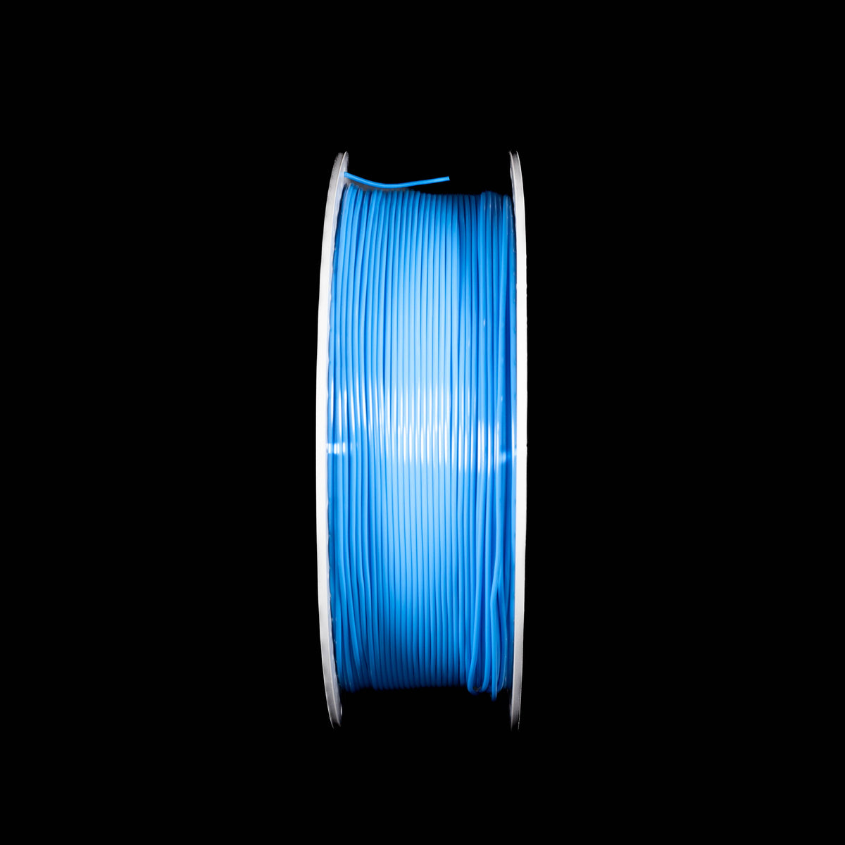 A spool of blue 3D printing filament centered against a solid black background.