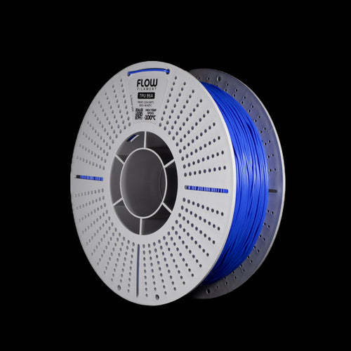 A spool of fluorescent blue 3D printer filament on a black background, featuring a white perforated spool with the brand name FLOW visible.