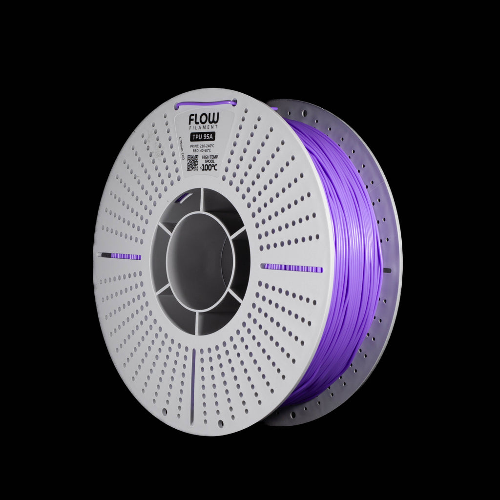A spool of fluorescent purple 3D printer filament on a black background, with the brand name FLOW visible on the top of the white preforated spool.