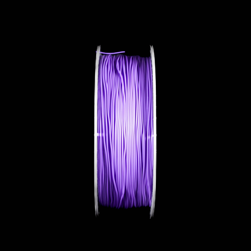 A spool of 3D printing filament wound tightly, showing a vibrant fluorescent purple color, isolated on a solid black background.