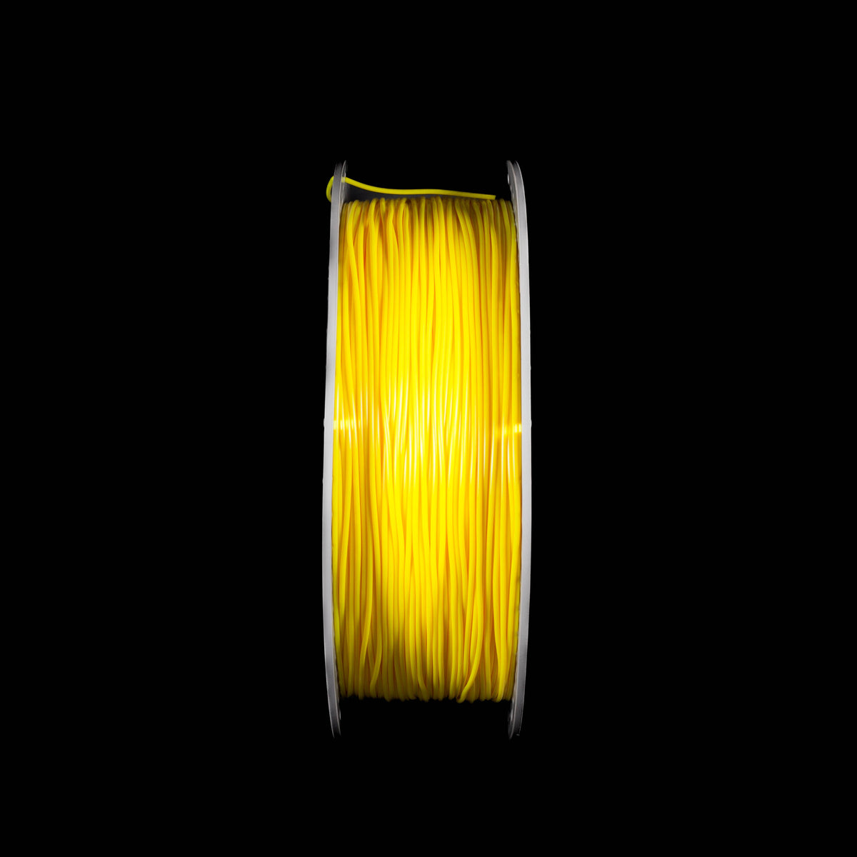 A spool of fluoscent bright yellow 3D printing filament, wound tightly on a white spool, set against a solid black background.
