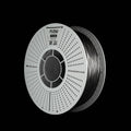 A spool of metallic space grey 3D printer filament on a solid black background. The spool is white with a circular perforated design and features the brand name 'FLOW' printed on the top.