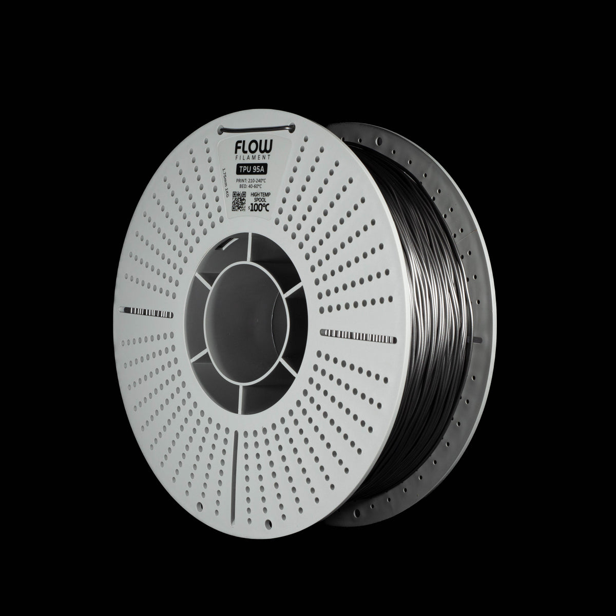 A spool of metallic space grey 3D printer filament on a solid black background. The spool is white with a circular perforated design and features the brand name 'FLOW' printed on the top.