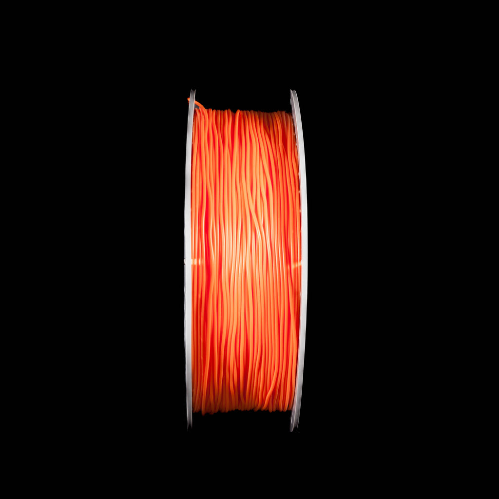 A spool of orange 3D printing filament, wound tightly on a white plastic core, set against a solid black background.