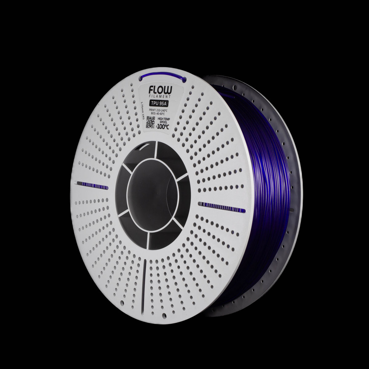 A spool of  3D printer filament wounded on a white plastic core banded FLOW FILAMENT, showing the deep purple translucent filament material, set against a solid black background.